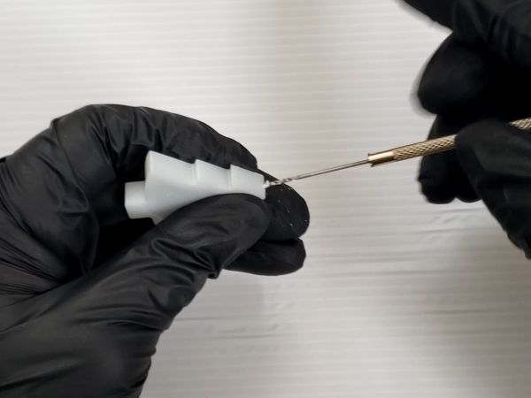 ④封入物を入れてフィルムを貼る