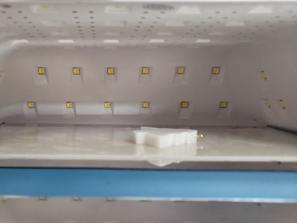 ④封入物を入れてフィルムを貼る