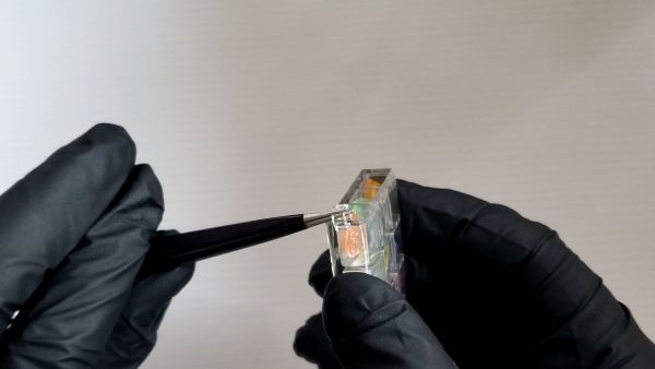 ③キャンディをケースに封入する
