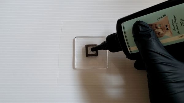 ②フィルムを接着して封入物を入れてコーティングする